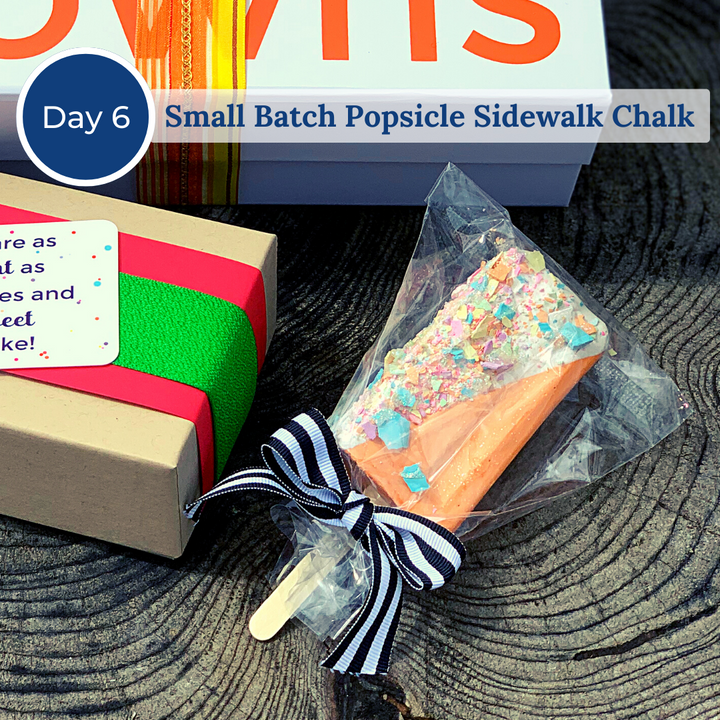 Cellophane-wrapped sidewalk chalk in the shape of a popsicle