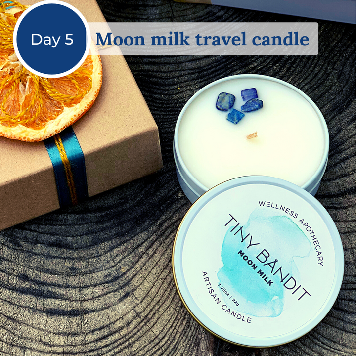 White moon milk travel candle with blue crystals